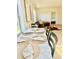 Bright dining area with table set for six, bathed in natural light at 6269 Skyline Ct, Spring Hill, FL 34606