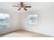 Bedroom with ceiling fan and two windows at 6269 Skyline Ct, Spring Hill, FL 34606