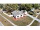 Aerial view of a house with a gray roof and landscaped yard at 6269 Skyline Ct, Spring Hill, FL 34606