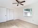 Well-lit bedroom with new flooring and fresh coat of paint at 6269 Skyline Ct, Spring Hill, FL 34606