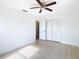 Spacious bedroom with ceiling fan and built-in closet at 6269 Skyline Ct, Spring Hill, FL 34606