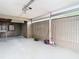 Attached garage with workbench and extra storage space at 6269 Skyline Ct, Spring Hill, FL 34606