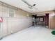 Attached garage with additional storage and work area at 6269 Skyline Ct, Spring Hill, FL 34606