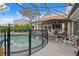 Screened pool and patio area with ample seating at 715 S Himes Ave, Tampa, FL 33609
