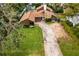 Aerial view of residential property, showcasing a house and yard at 715 S Himes Ave, Tampa, FL 33609