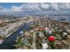 Stunning aerial view of the neighborhood, highlighting the property's prime waterfront location at 815 3Rd S Ave, Tierra Verde, FL 33715