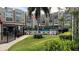 Community pool with surrounding patio furniture at 1243 S Martin Luther King Jr Ave # B205, Clearwater, FL 33756