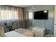 Bedroom with exercise bike and large sliding mirrored closet at 1243 S Martin Luther King Jr Ave # B205, Clearwater, FL 33756