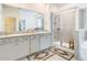 Modern bathroom with a large shower, soaking tub, and tile surround at 13444 Golden Lime Ave, Spring Hill, FL 34609