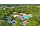 Community pool with playground and parking at 13444 Golden Lime Ave, Spring Hill, FL 34609