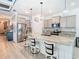 Modern kitchen with stainless steel appliances and a large island at 13444 Golden Lime Ave, Spring Hill, FL 34609
