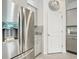 Stainless steel refrigerator with water dispenser in modern kitchen at 13444 Golden Lime Ave, Spring Hill, FL 34609