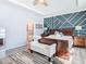Main bedroom with en-suite bathroom access and stylish decor at 13444 Golden Lime Ave, Spring Hill, FL 34609