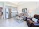 Relaxing living room area with a kitchenette and comfortable seating at 13444 Golden Lime Ave, Spring Hill, FL 34609