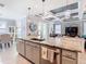 Kitchen island with granite countertops and ample seating at 13444 Golden Lime Ave, Spring Hill, FL 34609