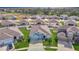 Aerial view of a house and neighborhood at 13444 Golden Lime Ave, Spring Hill, FL 34609