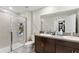 Modern bathroom with dual vanity, large shower, and updated fixtures at 3632 Bellmeade Ct, Wesley Chapel, FL 33543
