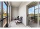 Relaxing screened porch with wicker chairs and peaceful views at 3632 Bellmeade Ct, Wesley Chapel, FL 33543
