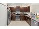 Modern kitchen with stainless steel appliances and ample cabinetry at 3632 Bellmeade Ct, Wesley Chapel, FL 33543