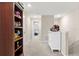Upstairs hallway with built-in shelving and storage at 3632 Bellmeade Ct, Wesley Chapel, FL 33543