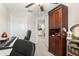 Home office with a keyboard, chair, and access to additional rooms at 3632 Bellmeade Ct, Wesley Chapel, FL 33543