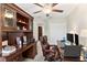 Spacious home office with built-in cabinetry and dual computer setup at 3632 Bellmeade Ct, Wesley Chapel, FL 33543