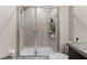 Clean shower with glass enclosure and tile surround at 3632 Bellmeade Ct, Wesley Chapel, FL 33543