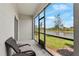 Relaxing screened porch overlooking a scenic pond at 3632 Bellmeade Ct, Wesley Chapel, FL 33543
