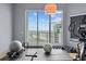 Modern home gym with city views, elliptical, weights, and mats at 449 S 12Th St # 2701, Tampa, FL 33602