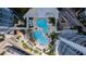 Aerial view of resort-style pool and deck area with multiple pools and comfortable lounge space at 449 S 12Th St # 2701, Tampa, FL 33602