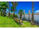 Park bench with scenic waterfront view at 901 Normandy Trace Rd, Tampa, FL 33602