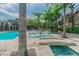 Relaxing pool area with fountains and landscaping at 901 Normandy Trace Rd, Tampa, FL 33602