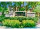 Island Walk Private Residences entrance sign, lush landscaping at 901 Normandy Trace Rd, Tampa, FL 33602