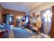 Living room with blue accents and wood paneling at 1010 Plaza St, Clearwater, FL 33755