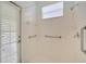 Accessible bathroom with walk-in shower and grab bars at 12611 River Birch Dr, Riverview, FL 33569