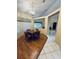 Charming dining area with wood floors and a chandelier at 1404 Woodstream Dr, Oldsmar, FL 34677