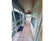 Spacious screened patio with tile flooring, great for relaxing outdoors at 1404 Woodstream Dr, Oldsmar, FL 34677
