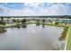 Community overview showcasing a waterfront view and lush landscaping at 1900 59Th N Ave # 305, St Petersburg, FL 33714