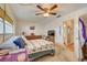 Spacious bedroom with a queen bed and ensuite bathroom access at 1900 59Th N Ave # 305, St Petersburg, FL 33714