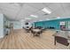 Spacious community room with plenty of seating and a large screen TV at 1900 59Th N Ave # 305, St Petersburg, FL 33714