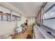 Bright Florida room with multiple windows and tiled floors at 1900 59Th N Ave # 305, St Petersburg, FL 33714