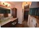 Bathroom has a vanity and a stylish walk-in shower with unique blue tiling at 2918 10Th N St, St Petersburg, FL 33704
