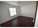 Bright bedroom with dark hardwood floors and a ceiling fan at 2918 10Th N St, St Petersburg, FL 33704