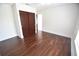 This bedroom offers hardwood floors and a large closet with wood sliding doors at 2918 10Th N St, St Petersburg, FL 33704