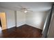 Cozy bedroom featuring hardwood floors and a ceiling fan at 2918 10Th N St, St Petersburg, FL 33704