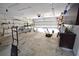 Spacious garage with ample storage shelving and workbench at 2918 10Th N St, St Petersburg, FL 33704