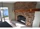 Stone fireplace in a room with sliding door access to the outside; perfect for cozy evenings and indoor-outdoor living at 2918 10Th N St, St Petersburg, FL 33704