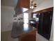Kitchen with stainless appliances, brown wooden cabinets and plenty of counter space at 2918 10Th N St, St Petersburg, FL 33704