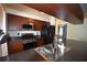 Modern kitchen with stainless appliances overlooking a dining area in an open floor plan at 2918 10Th N St, St Petersburg, FL 33704