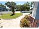 Beautiful landscaping features a stone walkway and lush greenery leading up to this charming home at 2918 10Th N St, St Petersburg, FL 33704